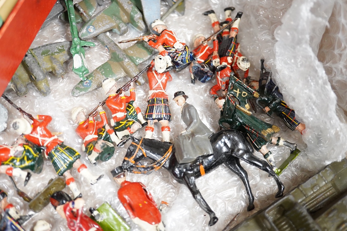 A collection of lead soldiers by Britains, etc. including Scottish Highlanders, together with a number of diecast military aircraft and a boxed Schuco Telesteering Car 3000
